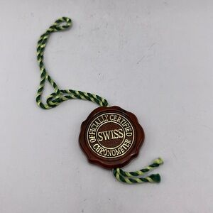 Rolex hologram maroon hang tag